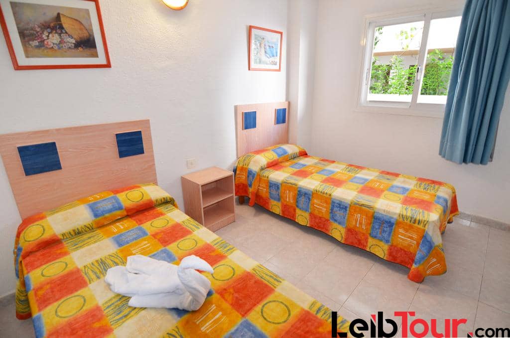 Playa den Bossa apartment pool 3 guests Ibiza PLSOLAP Bedroom - LeibTour: TOP aparthotels in Ibiza