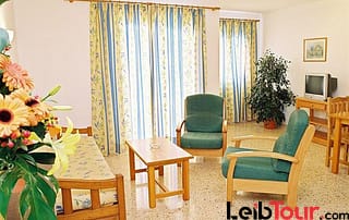 Cheap Apartment Cafè del Mar with pool SAPONI Living Room - LeibTour: TOP aparthotels in Ibiza