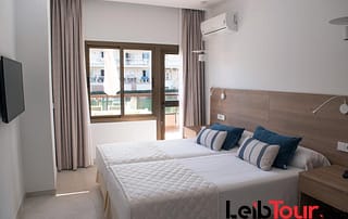 Spacious apartment with pool perfect for large groups MARPALSA Bedroom - LeibTour: TOP aparthotels in Ibiza